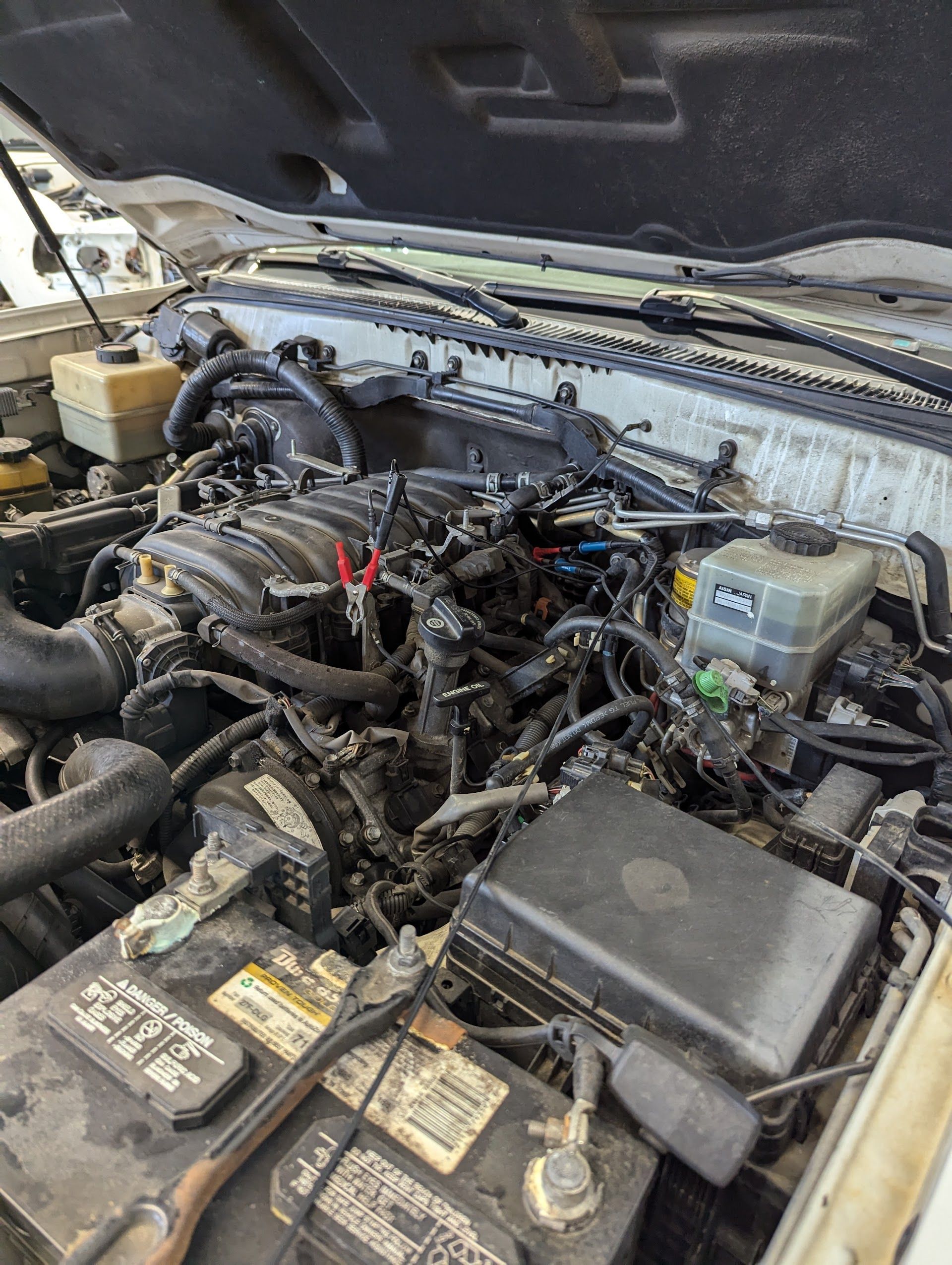 A Close Up of a Car Engine With the Hood Open | OTRAMM Auto Repair