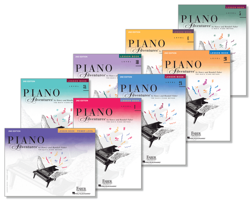 A group of piano books are stacked on top of each other on a white background.