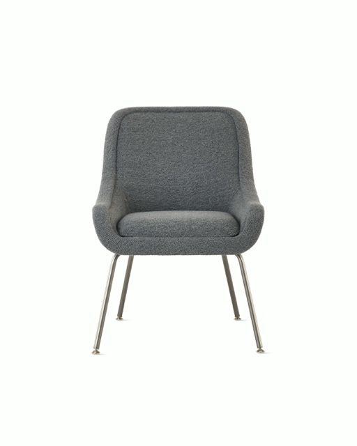 Gray upholstered accent chair with metal legs on a white background