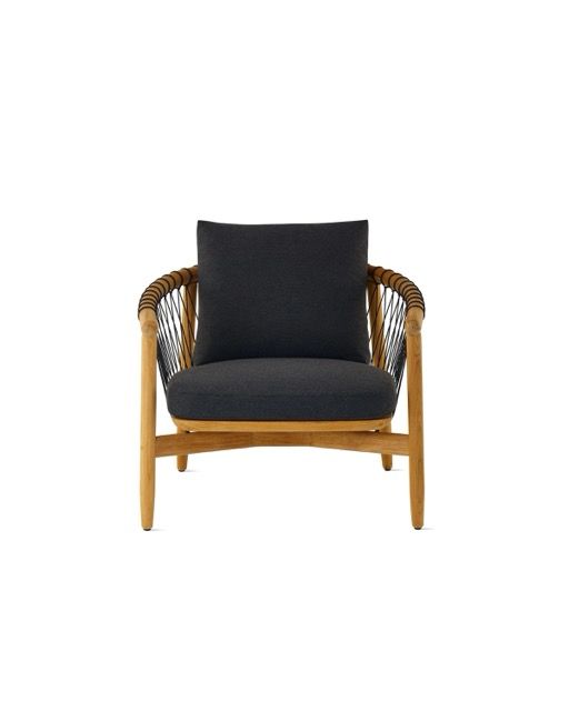 Modern lounge chair with black cushion, woven brown sides, and light wood frame on a white background