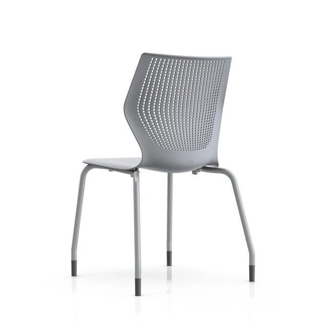Gray perforated plastic chair with metal legs on a white background