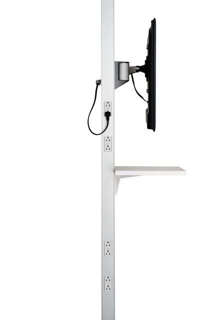 Side view of a white adjustable monitor mount with a black screen and attached cable on a pole.
