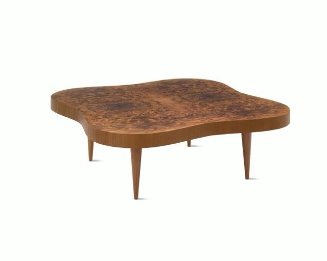 Small brown wooden coffee table with four tapered legs on a white background
