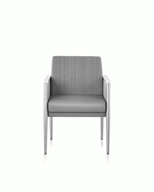 Modern gray upholstered chair with metal legs on a white background