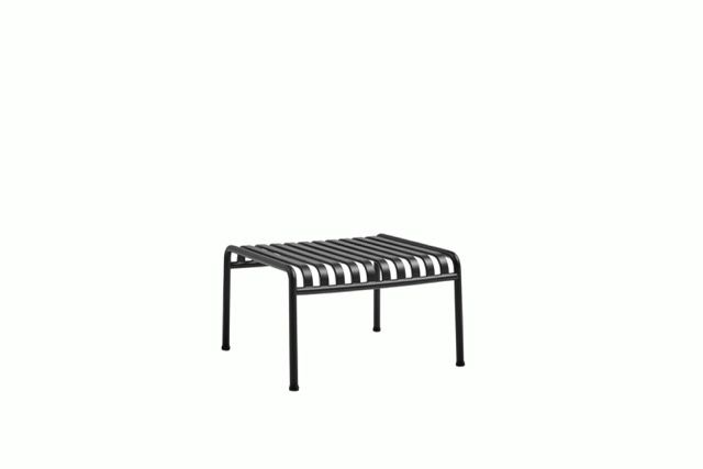 Black metal slatted bench on a white background