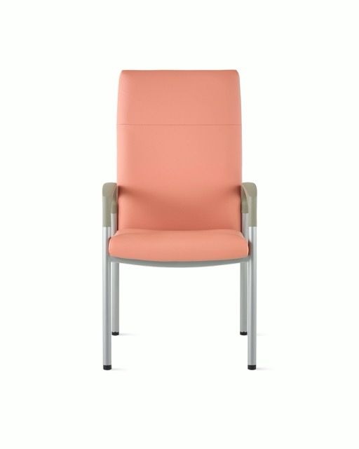 Pink upholstered chair with metal legs on a white background