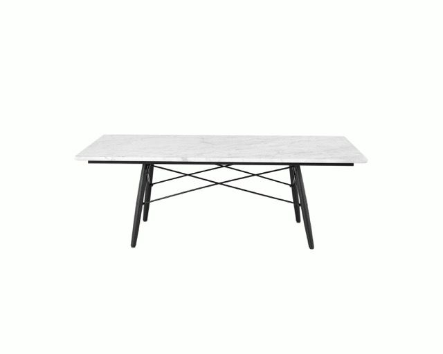 Rectangular marble-top dining table with black metal legs on a white background