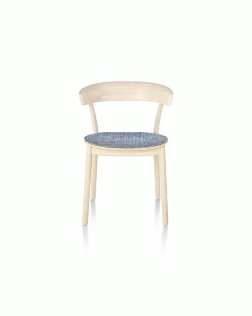 Light wood chair with a blue upholstered seat on a white background
