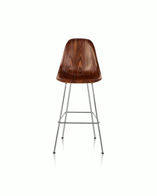Wooden bar stool with chrome legs on a white background