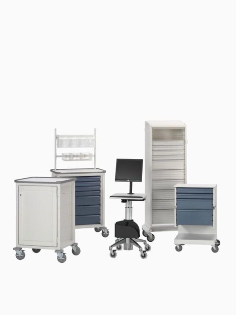 Two wheeled medical storage carts, one with glass doors and one with drawers, in white and blue-gray.