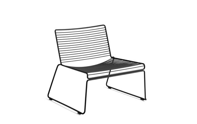 Modern wire-frame lounge chair with black seat and light striped backrest