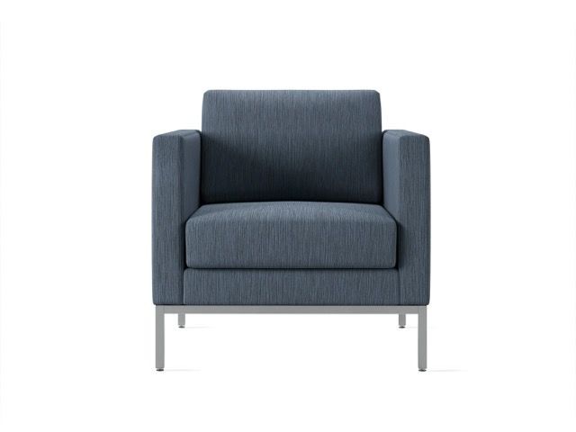 Blue upholstered armchair with metal legs on a white background