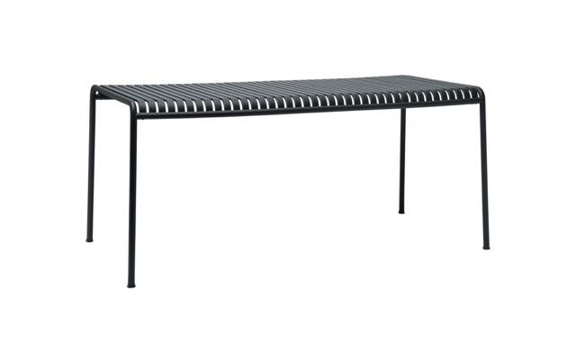 Black metal bench with perforated top on a white background