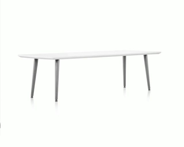 Minimalist white bench with light wood legs on a plain white background