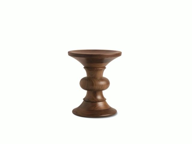 Black stool-shaped suction cup massage tool on a white background