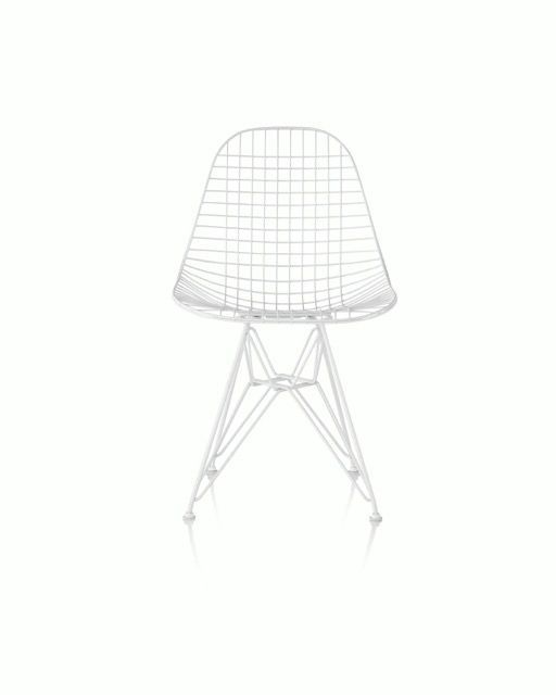 White wire-frame chair with a geometric seat and slender metal legs on a plain white background