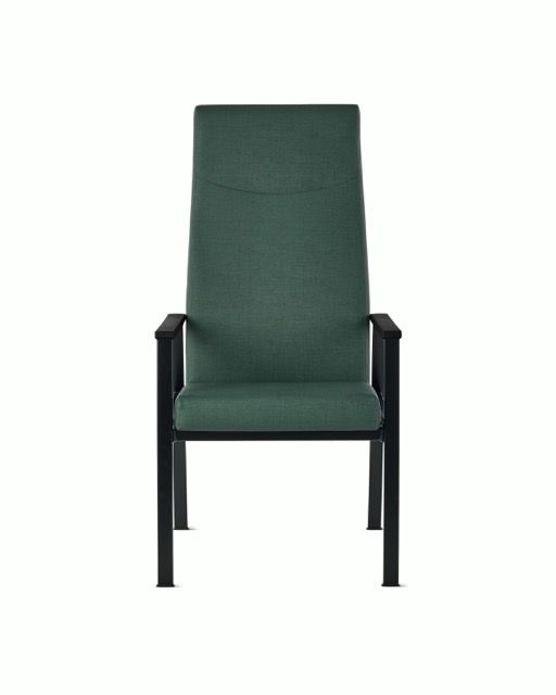 Green upholstered chair with black metal frame on a white background