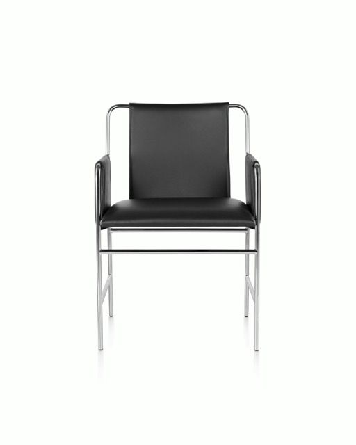 Black leather chair with chrome frame on a white background