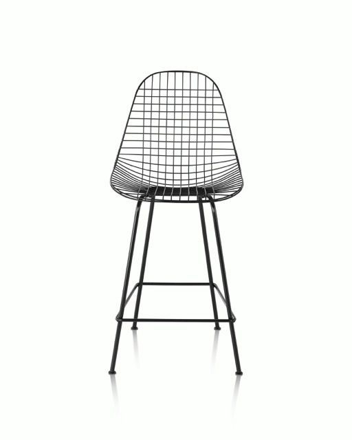 Black wire-frame bar stool with a curved back and seat on a white background