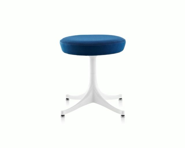 Blue round stool with a white pedestal base on a white background