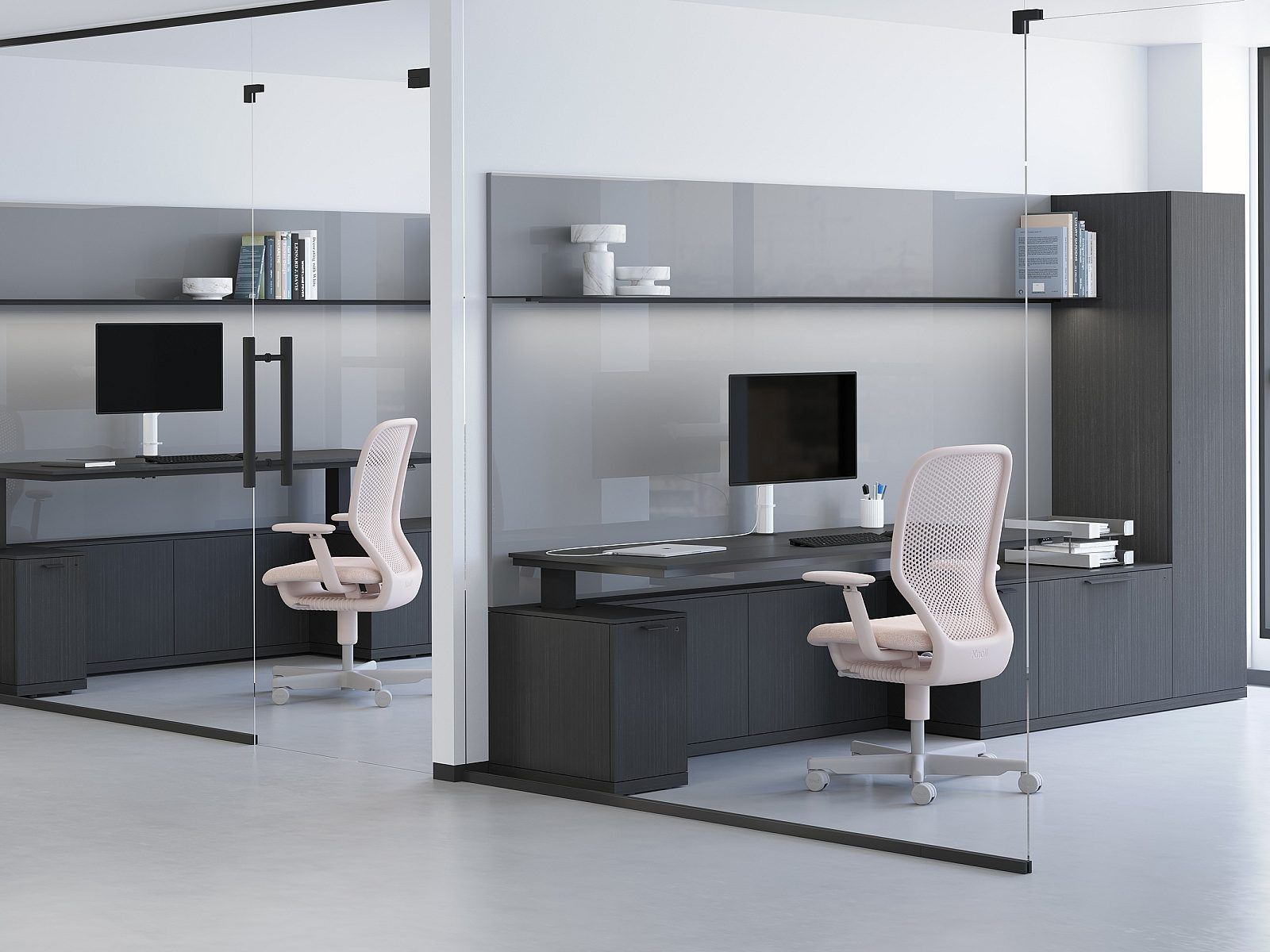 Modern office cubicles with desks, computers, gray storage, and beige office chairs
