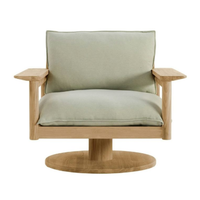 Wooden swivel lounge chair with light green cushions and a round base