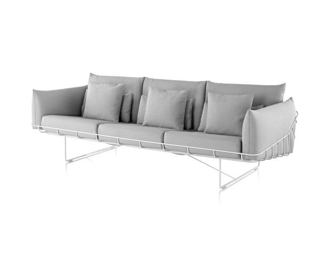Gray modern outdoor sofa with white metal frame and cushions
