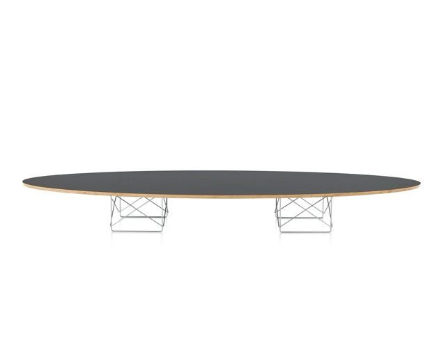 Modern oval table with a dark top and white wire-frame legs on a white background