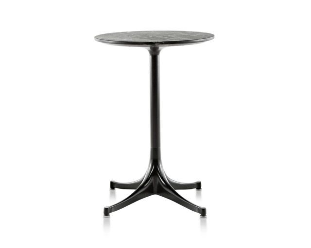 Round black pedestal table with a narrow base on a white background
