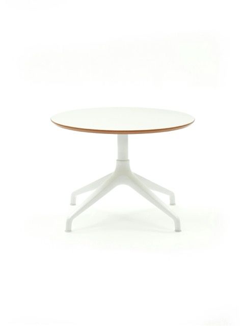 White round pedestal table on a white background