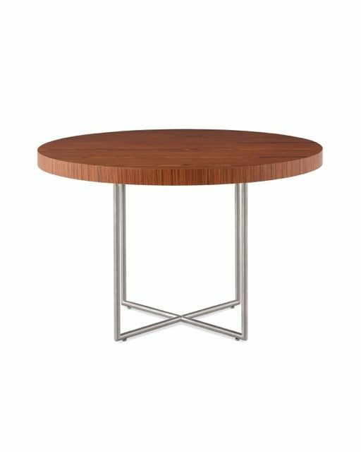 Round wooden table with silver metal legs on a white background.