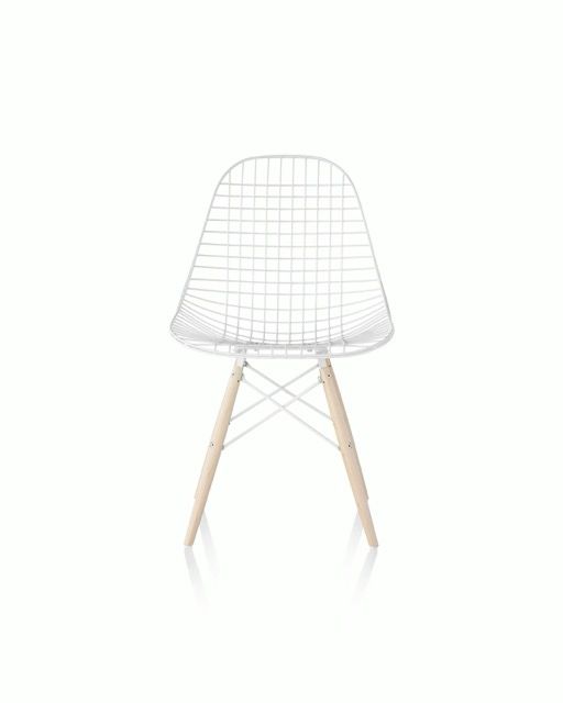 White wire chair with light wood legs on a white background