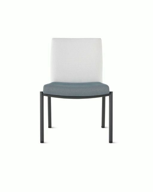 Modern chair with light gray backrest, blue seat cushion, and black metal legs on a white background