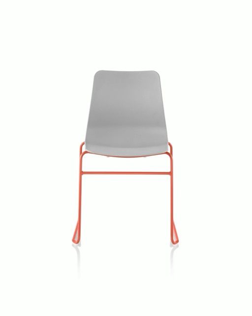 Gray chair with orange metal frame on a white background.