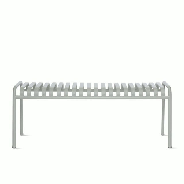 Gray metal slatted bench on a white background