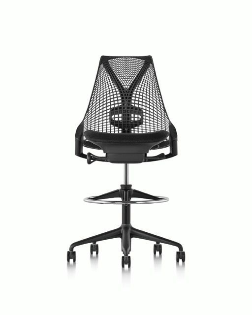 Modern black mesh office chair with five-star base and caster wheels on a white background