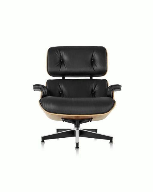 Black leather office chair with headrest and armrests on a white background
