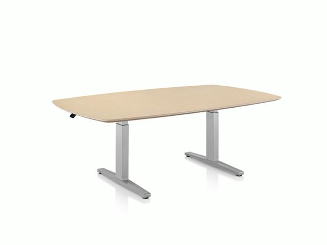 Beige office desk with two gray metal legs on a white background