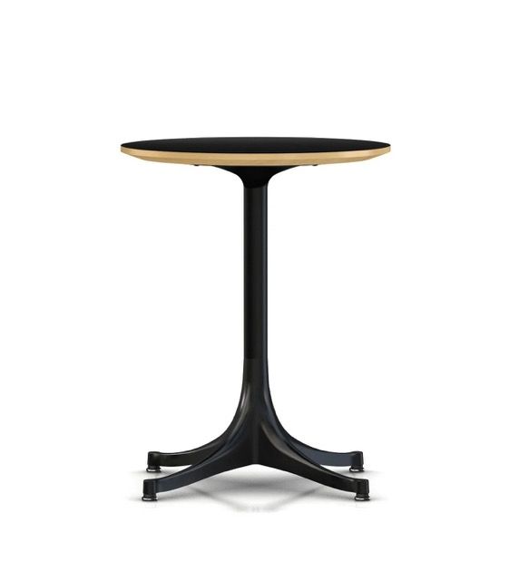 Black pedestal side table with round wood top on a white background