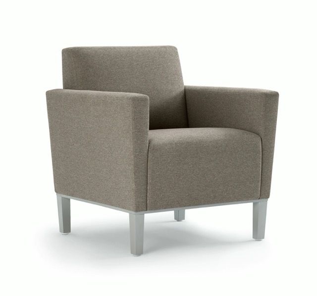 Gray upholstered armchair with wooden legs on a white background