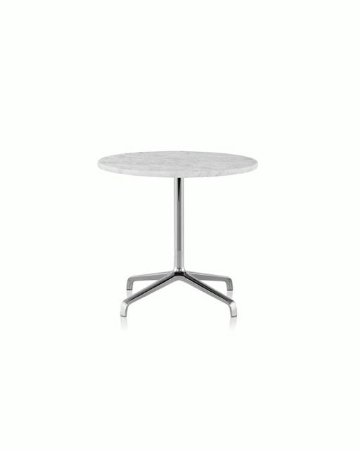 Round gray tabletop on a chrome pedestal base with four casters.