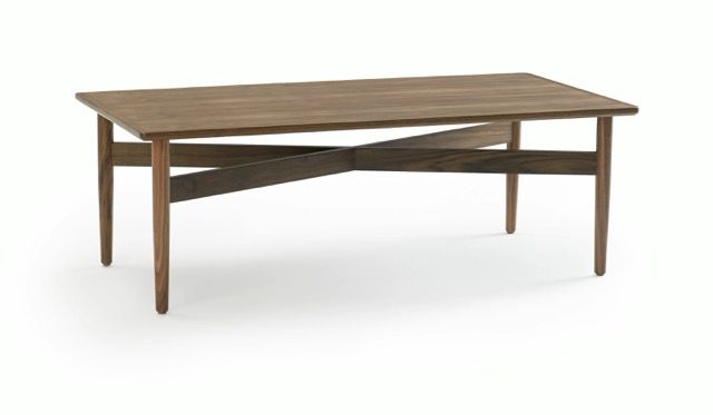Wooden rectangular coffee table with angled legs and lower stretcher on a white background