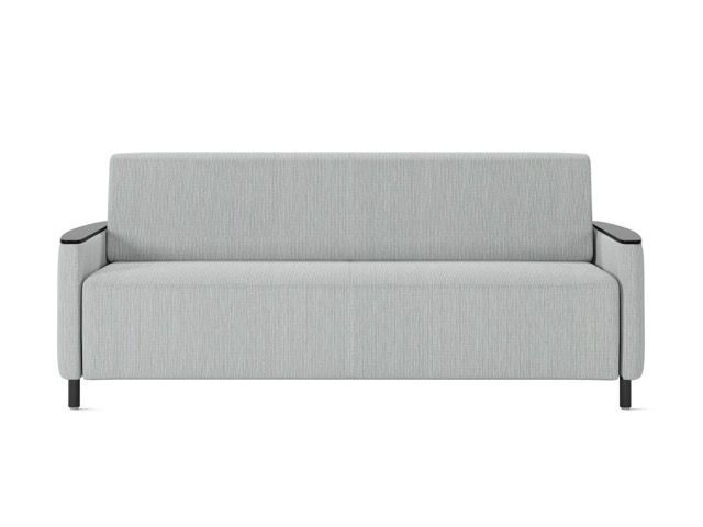 Light gray modern sofa with low arms and metal legs on a white background
