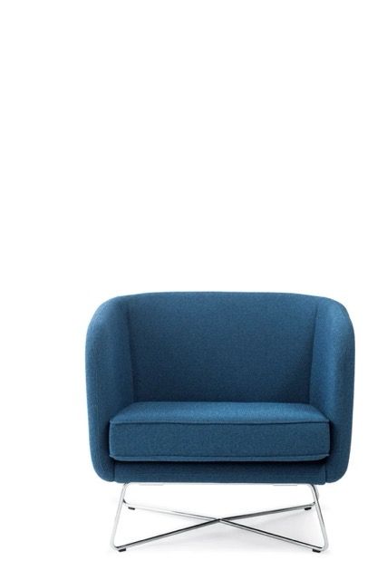 Blue upholstered armchair with chrome legs on a white background