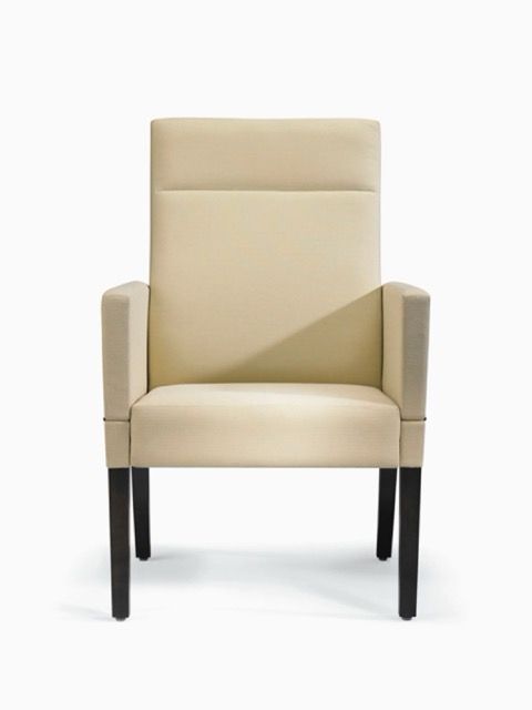 Beige upholstered dining chair with black legs on a white background
