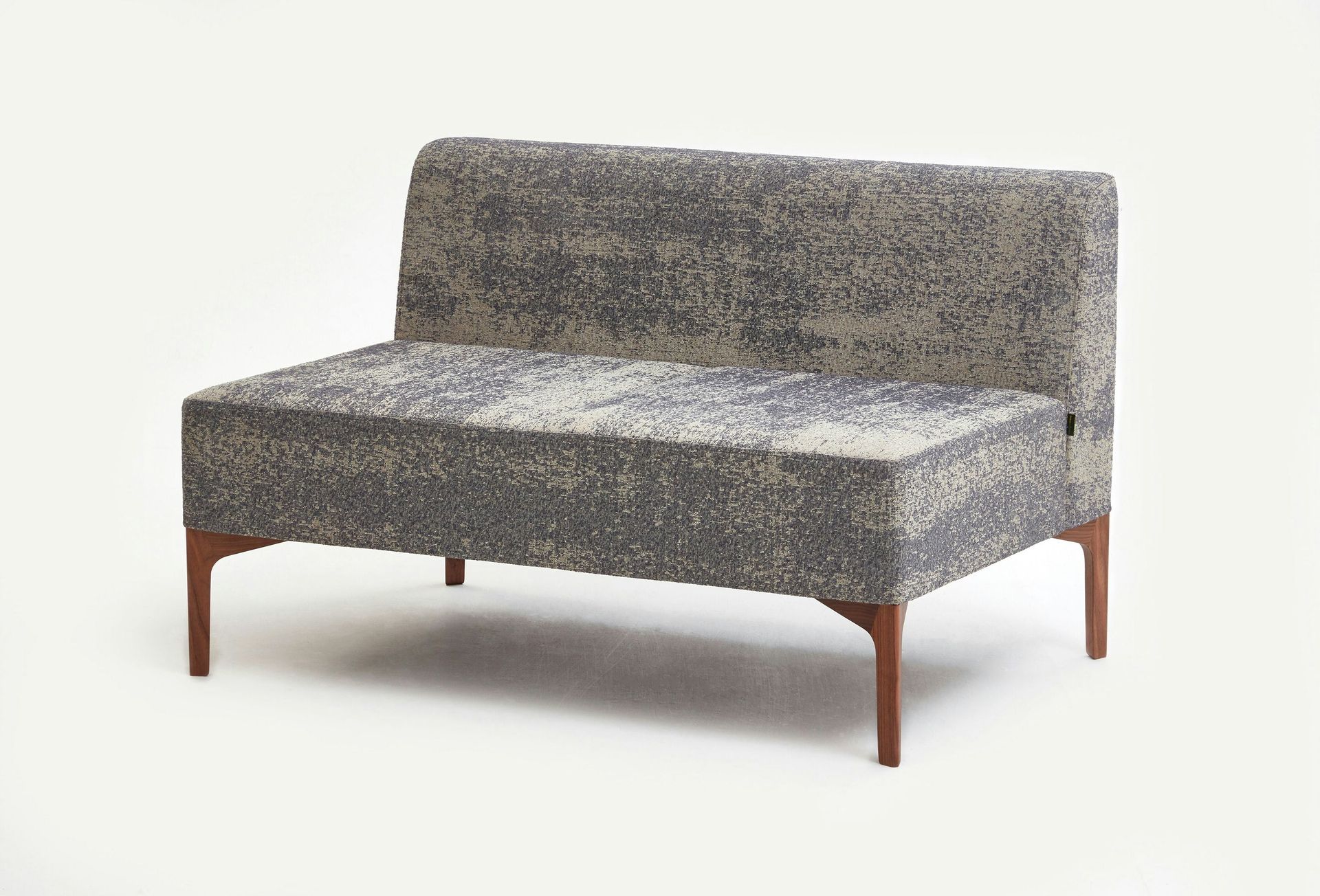 Gray upholstered loveseat with wooden legs on a white background