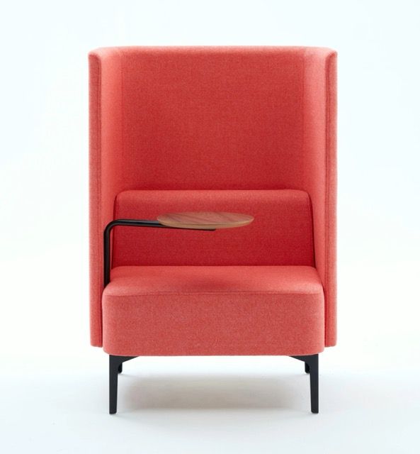 Red upholstered lounge chair with black legs and an attached side shelf on a white background