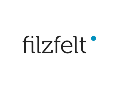 Filzfet logo in black lowercase text with a blue dot