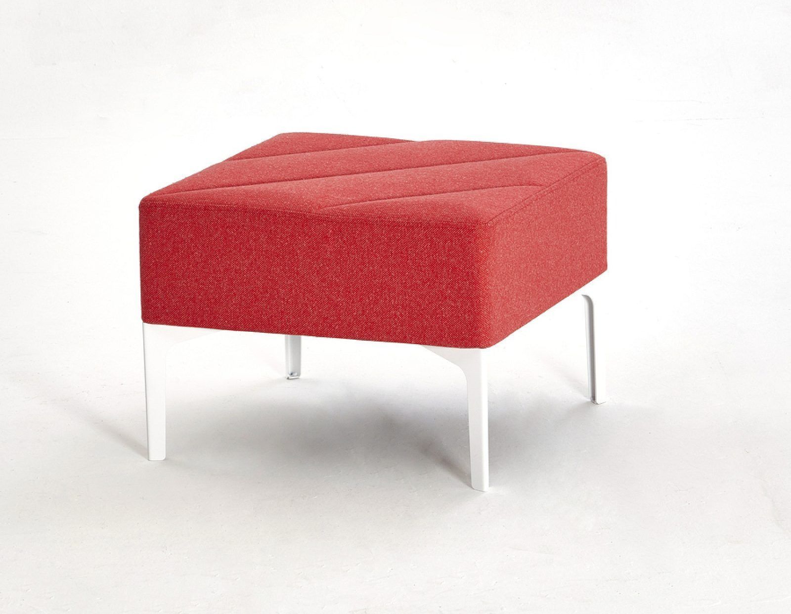 Blue upholstered ottoman with tufted top and white legs on a white background