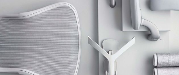 Monochrome collage of a chair, desk lamp, faucet, and rolled towel on a light gray background